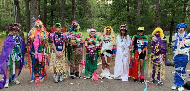 youth counselors at summer camp in costumes