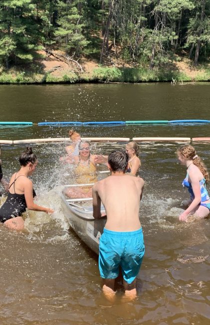 kids splashing in a river
