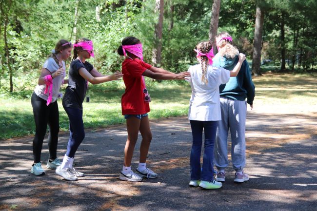campers playing a game outside